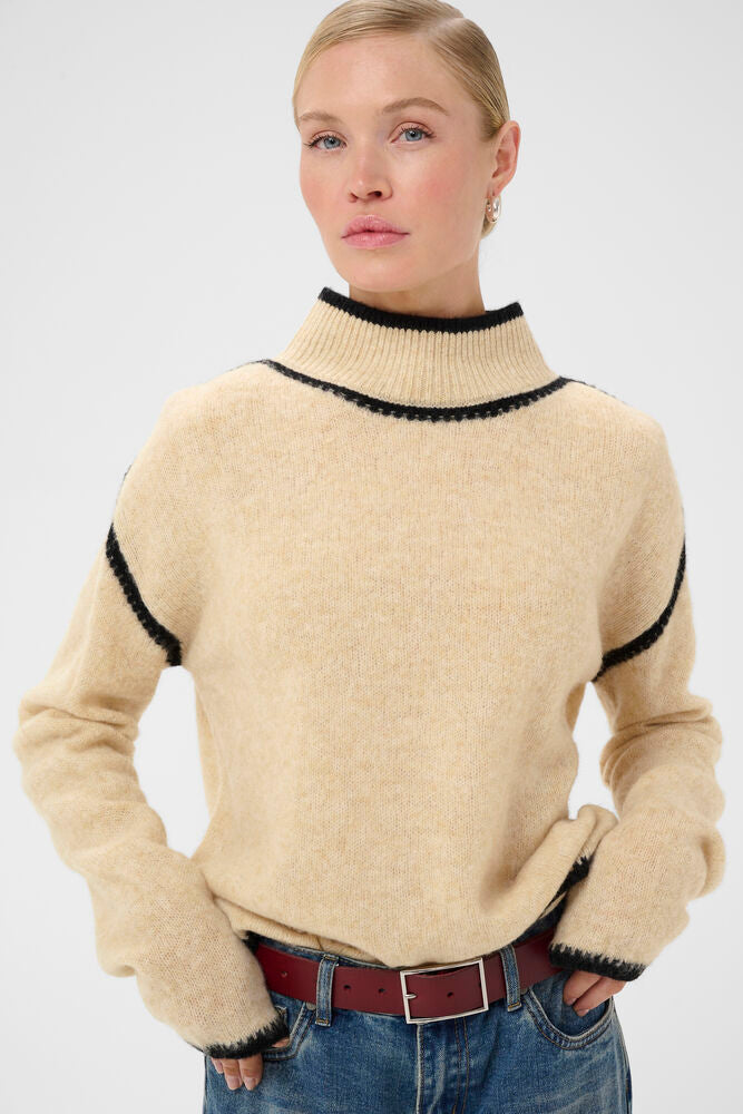 Close-up of Culture Jia Katrina cream wool jumper black contrast trim