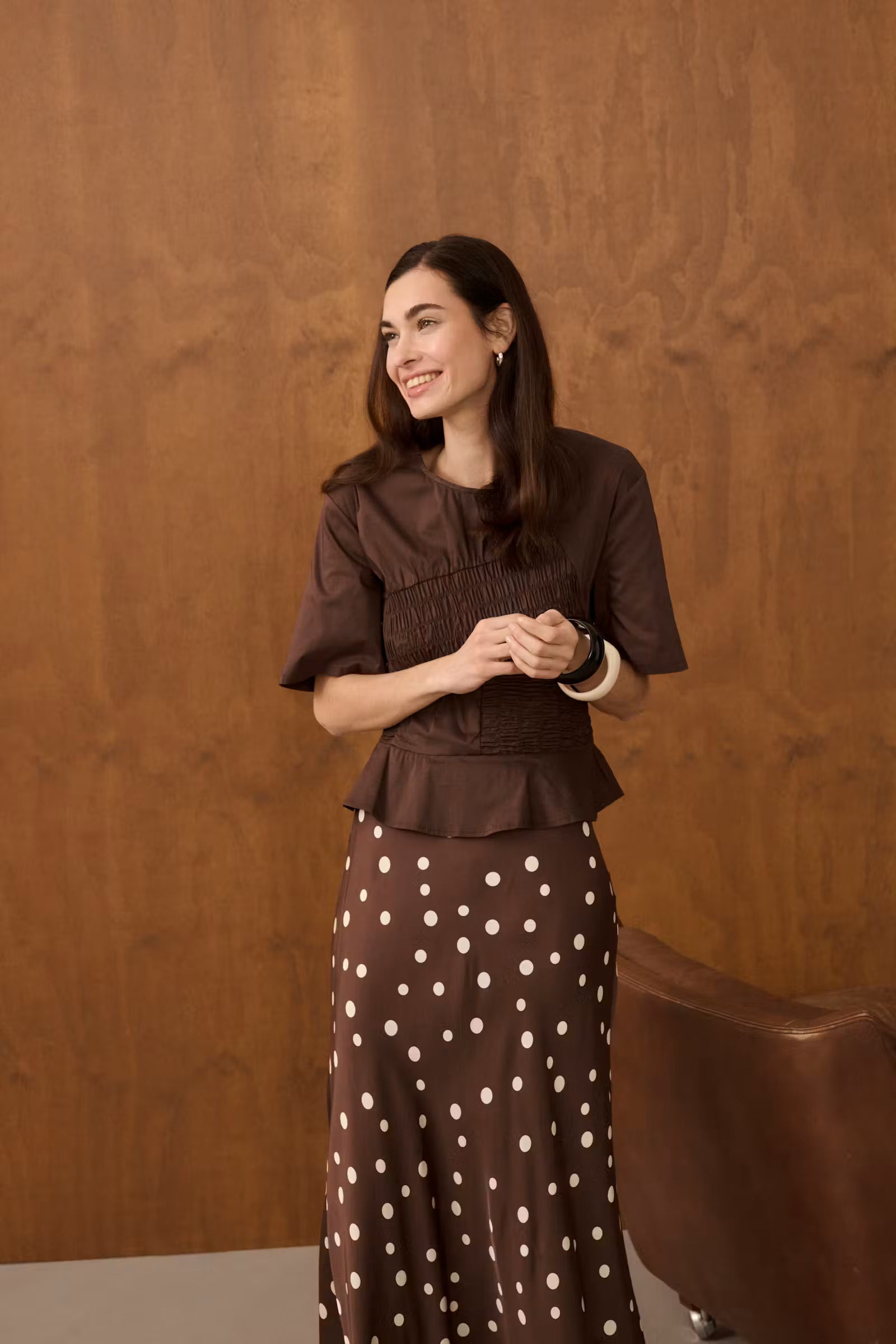 Culture Dotty Berna printed midi skirt styled with a short sleeve brown top