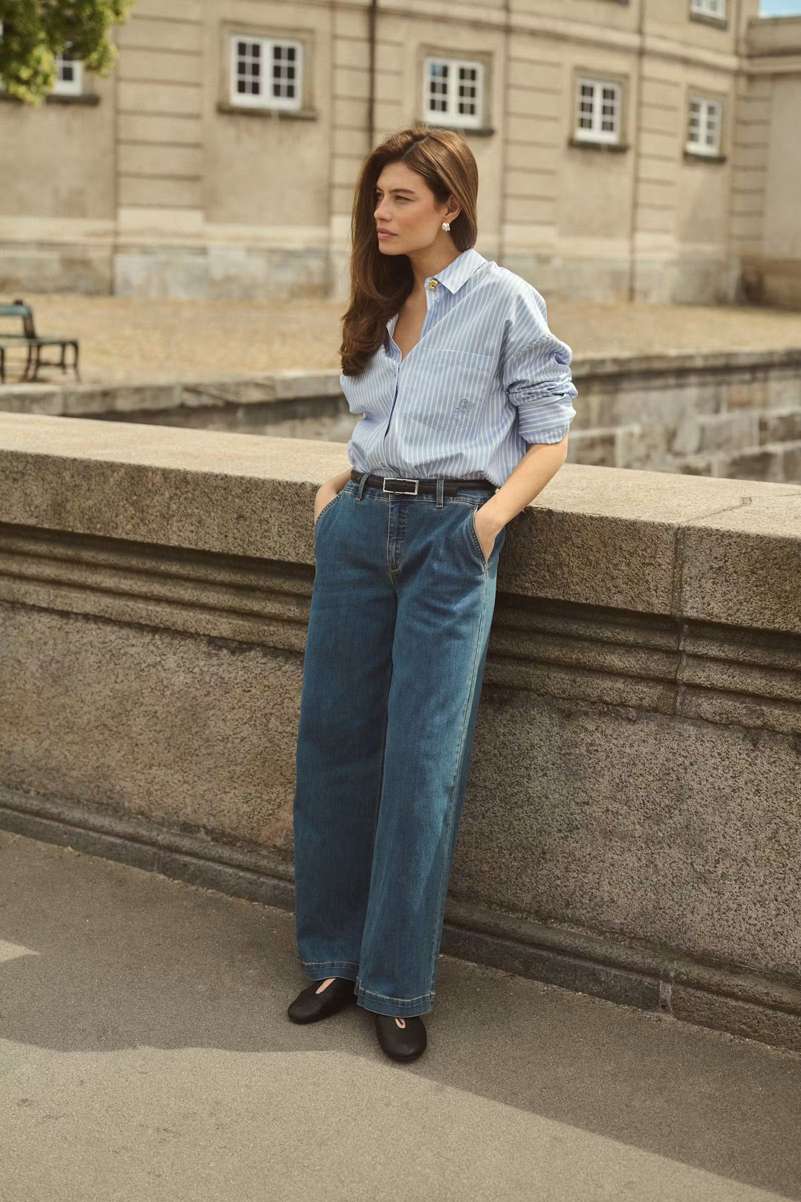 Culture Manga blue striped shirt styled outdoors with blue jeans