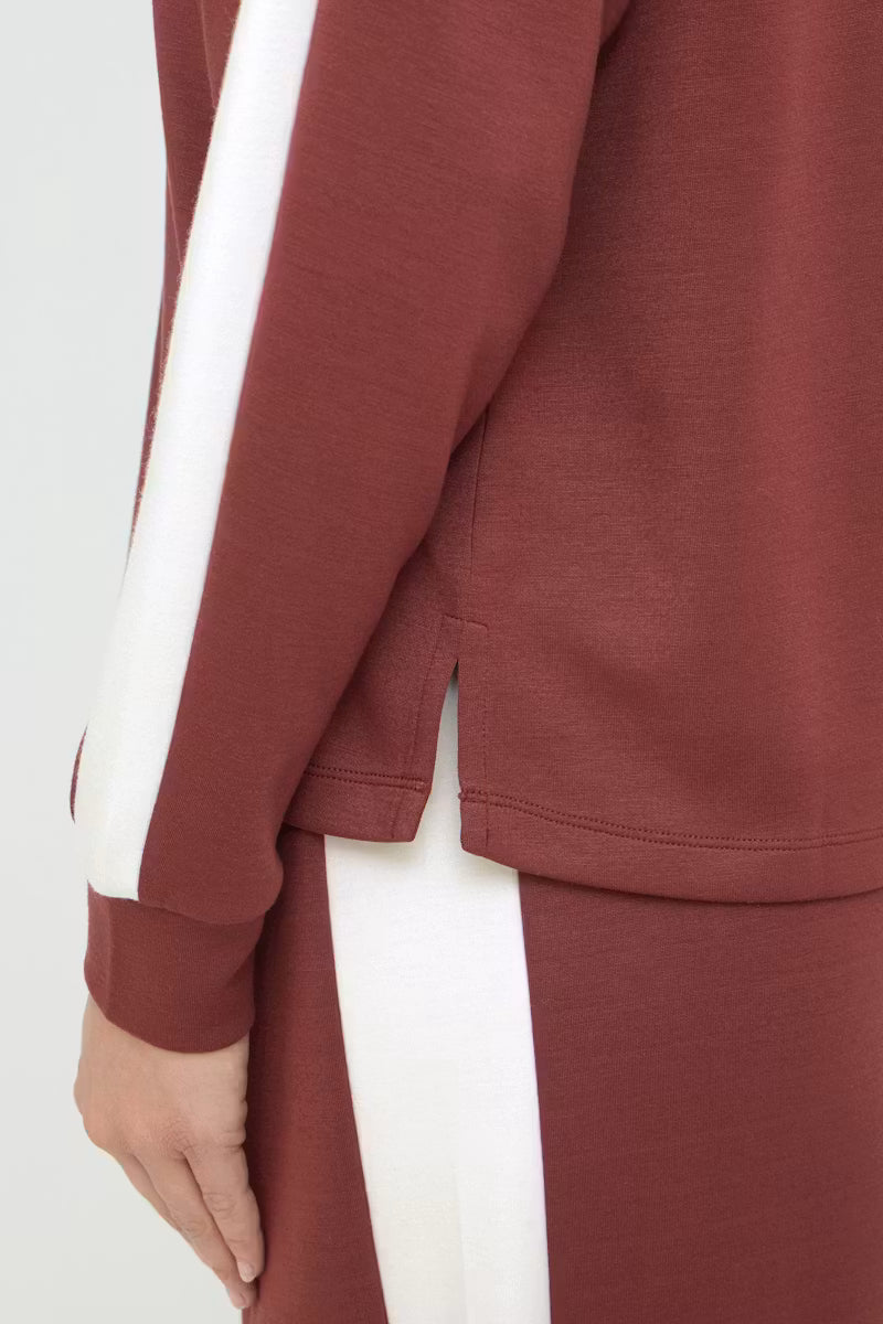 Close-up of Fransa Aurora sweatshirt white sleeve stripe and side-split hem