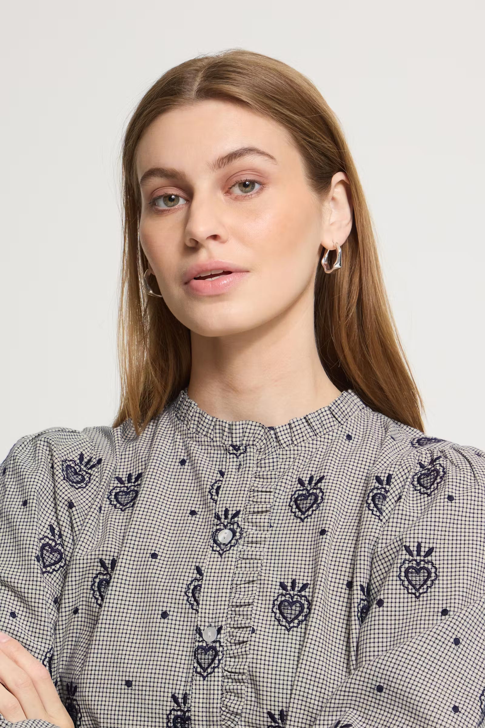 Close-up of ICHI Heloza dark blue print blouse ruffled stand collar