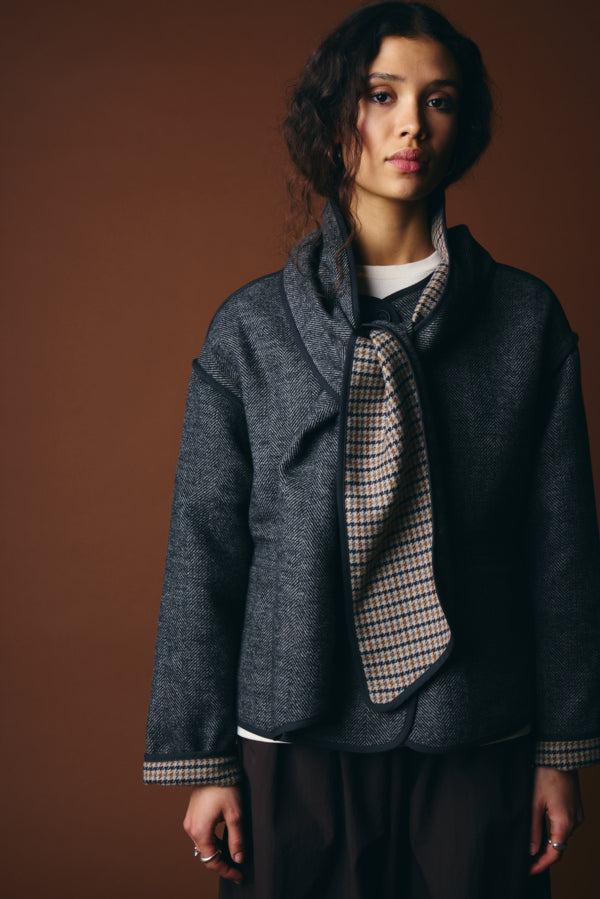 Close-up of ICHI Frava herringbone jacket sleeve and contrast cuff and scarf detail