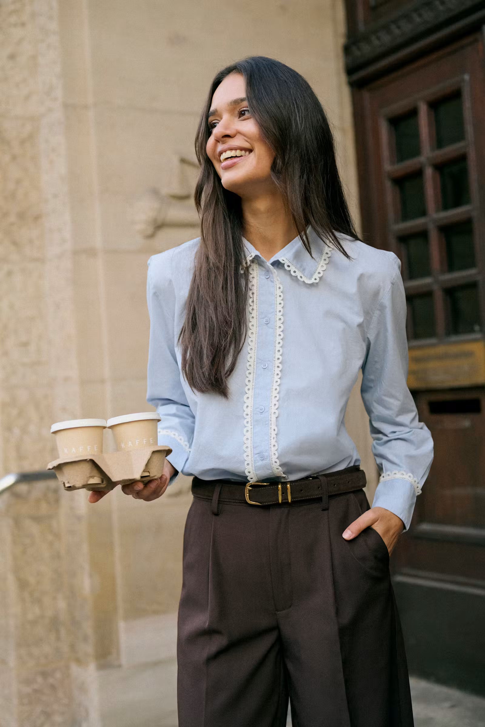 Kaffe Kaketty light blue button-up blouse styled outdoors - trending colour combos AW 2026