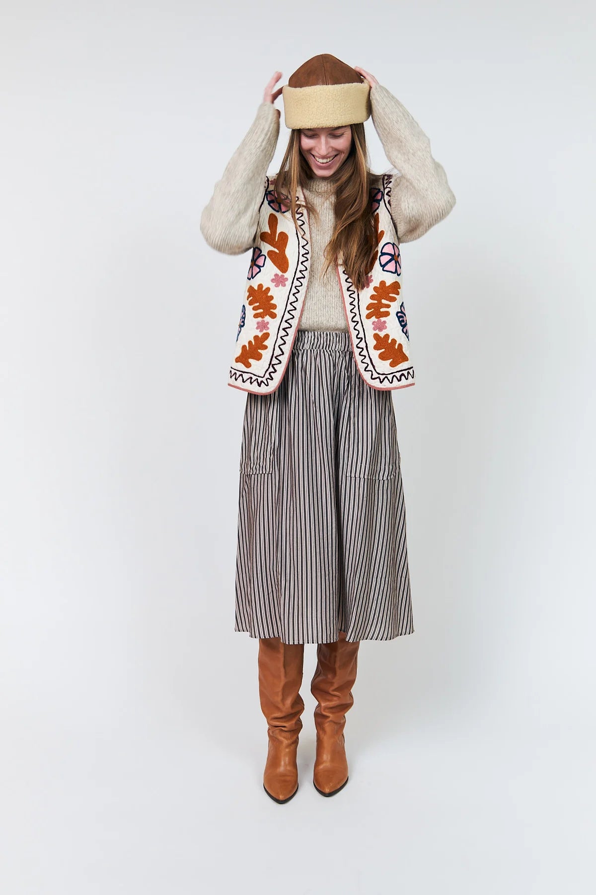 Lollys Laundry Honey cream Suzani embroidered vest styled with knitwear front view