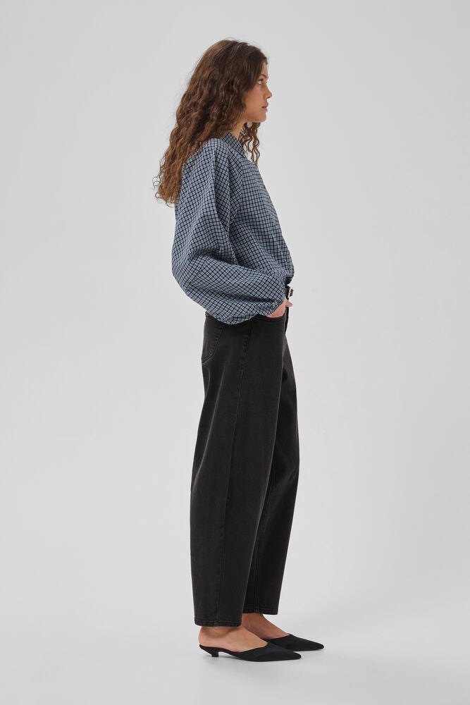 Side view of My Essential Wardrobe Baloo dark grey tapered barrel jeans