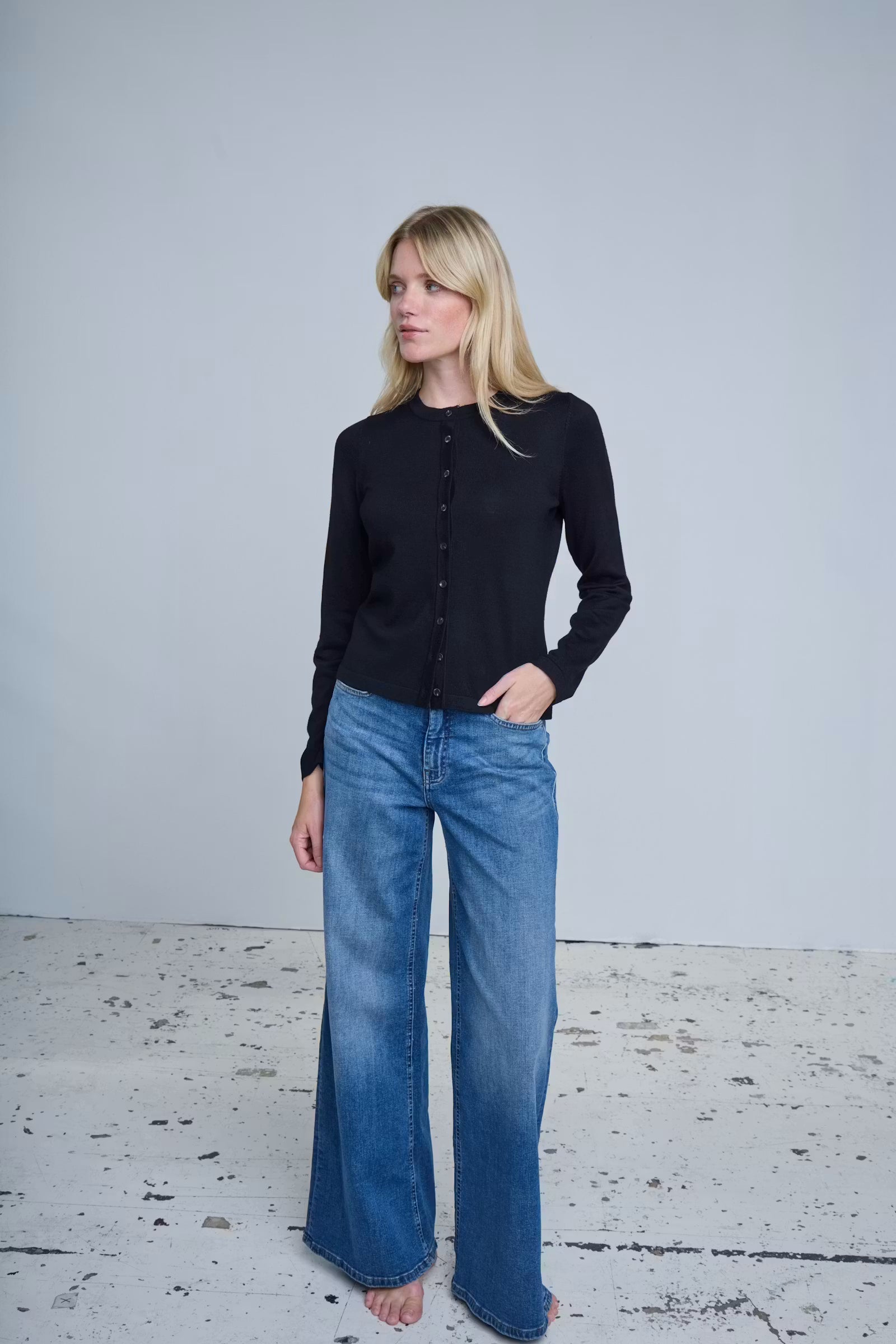 Close-up of ICHI Twiggy medium blue jeans back pocket stitching
