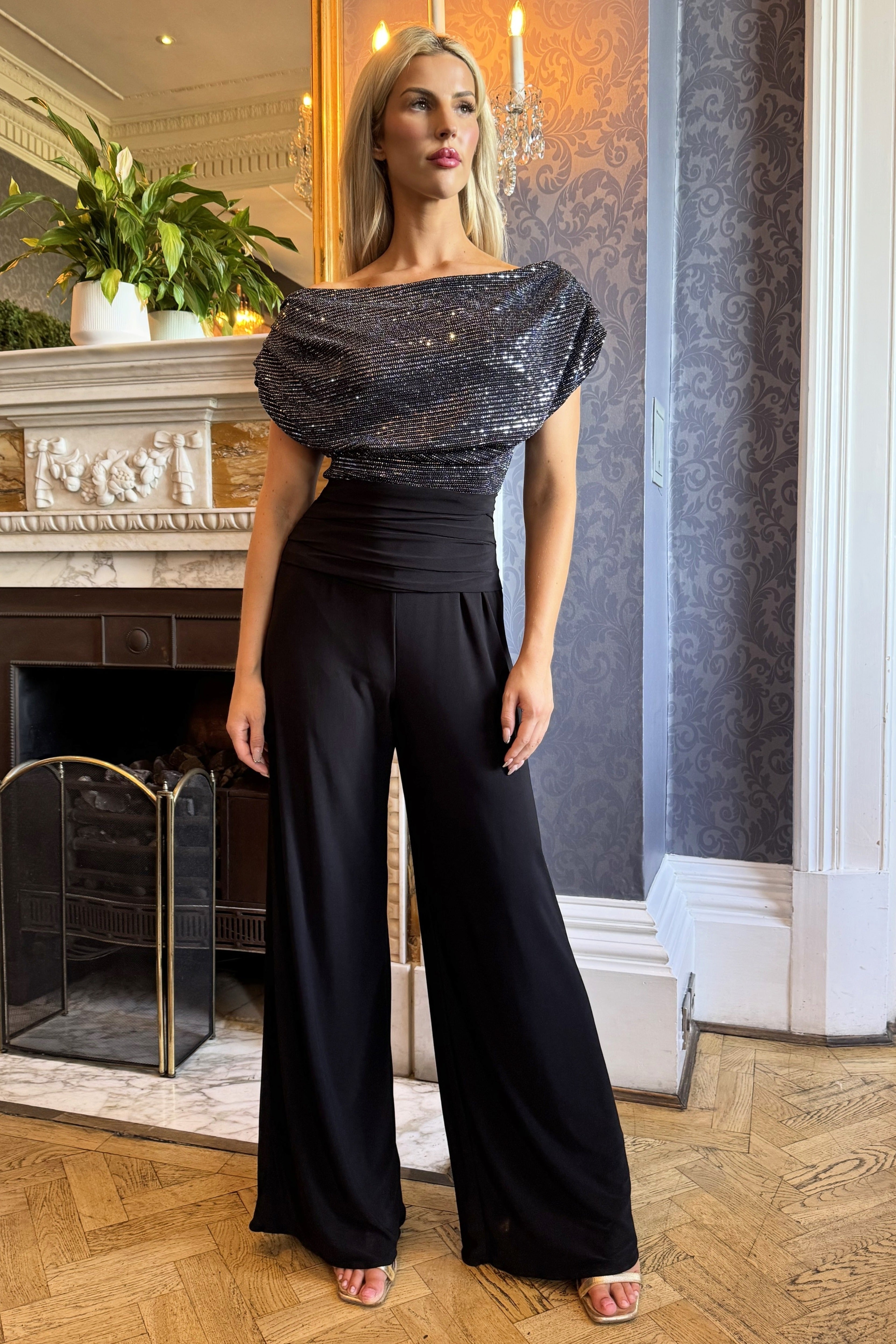 Atom Carbon gunmetal sparkle off shoulder jumpsuit full-length pose