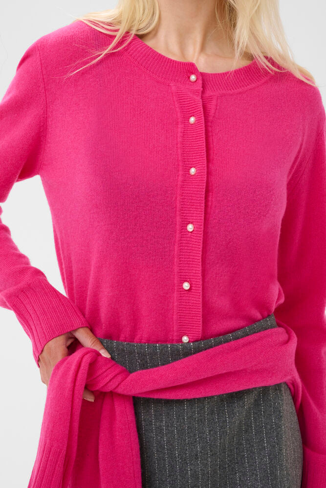 Close-up of Culture Taia Arrow pink wool cashmere button cardigan