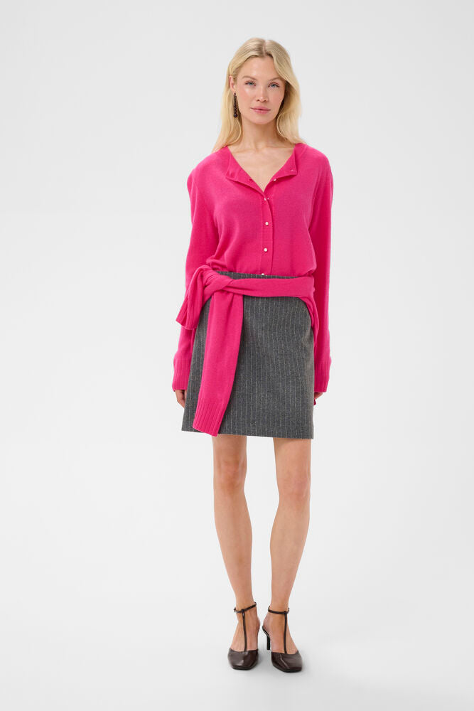 Culture Taia Arrow pink wool cashmere cardigan styled with grey skirt