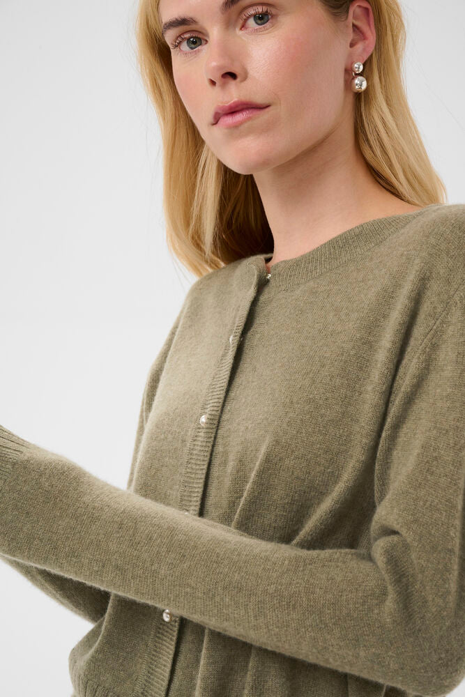 Close-up of Culture Taia Arrow Green Melange wool cashmere knit cardigan