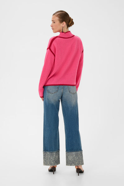 Back view of Culture Jia Katrina Fandango Pink wool turtleneck jumper