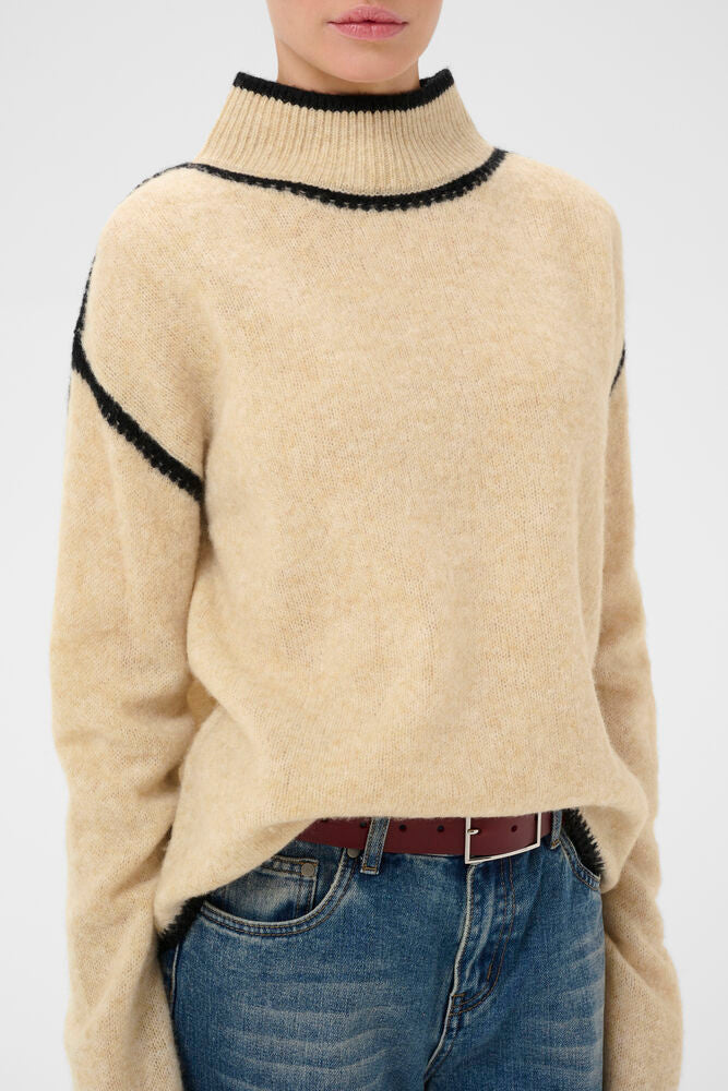 Culture Jia Katrina cream and black contrast wool jumper styled with jeans