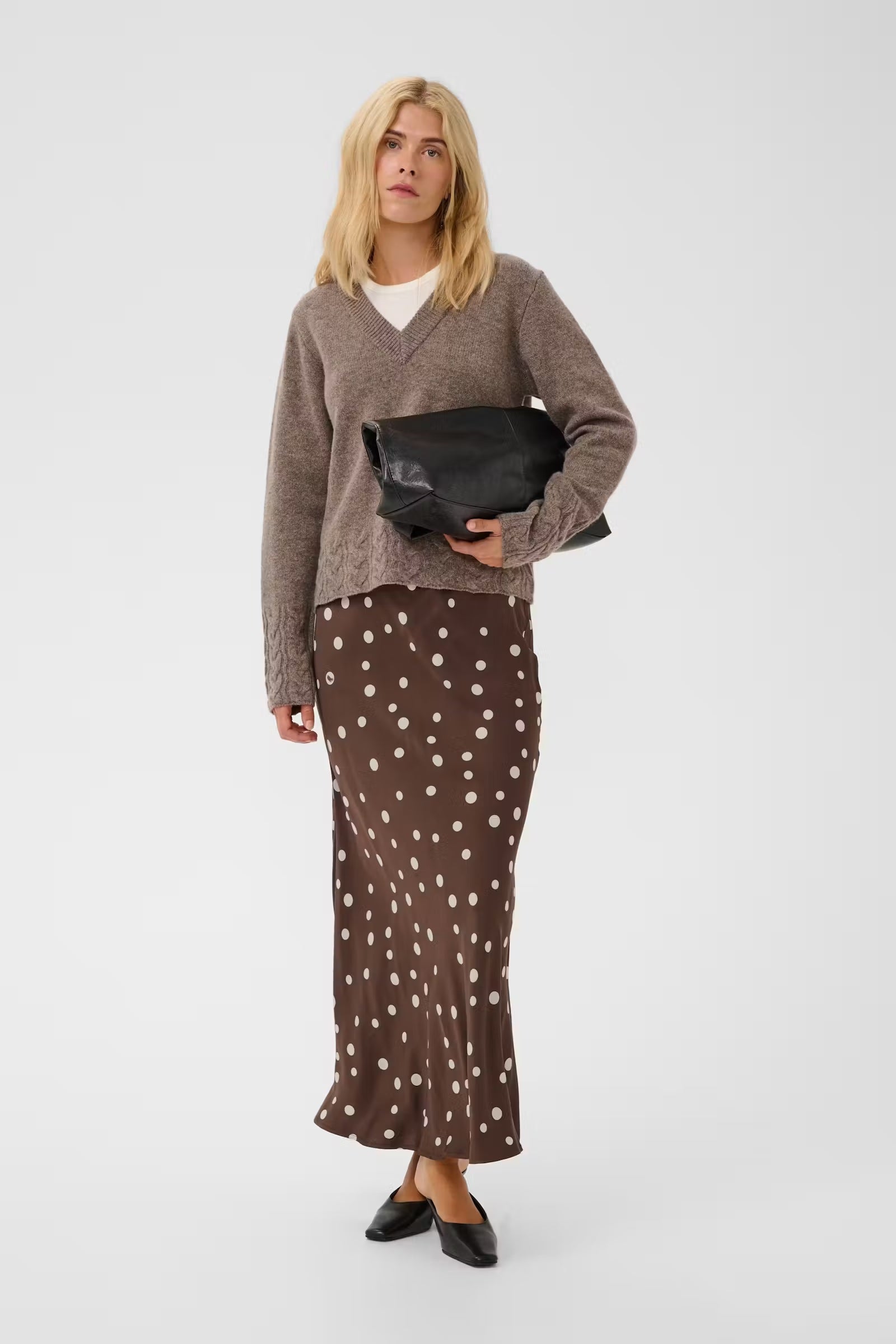 Culture Dotty Berna polka dot midi skirt styled with a taupe V-neck jumper