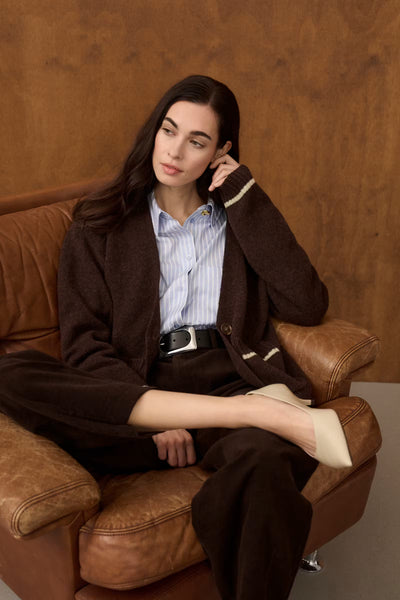 Culture Manga blue and white striped shirt layered under a brown blazer