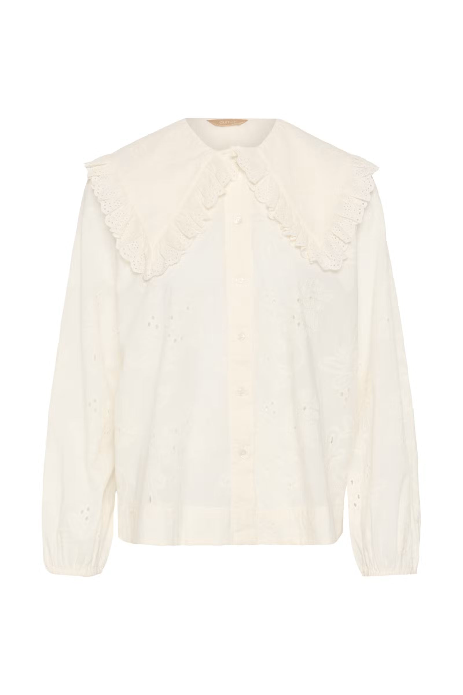 Culture Claramille broderie anglaise blouse styled with blue denim street view