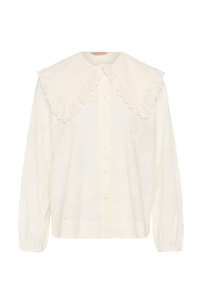 Culture Claramille broderie anglaise blouse styled with blue denim street view