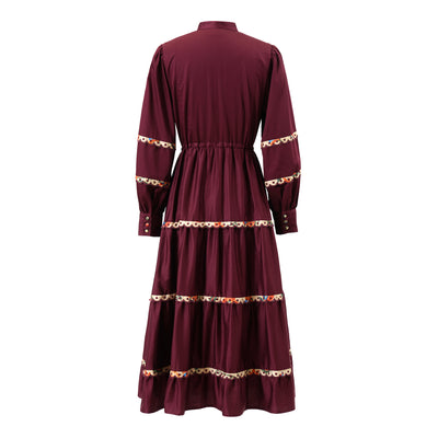 Back view of Emily Lovelock Annette Cherry Lacquer tiered midi dress