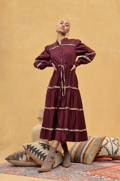 Emily Lovelock Annette Cherry Lacquer long sleeve tiered dress styled front view