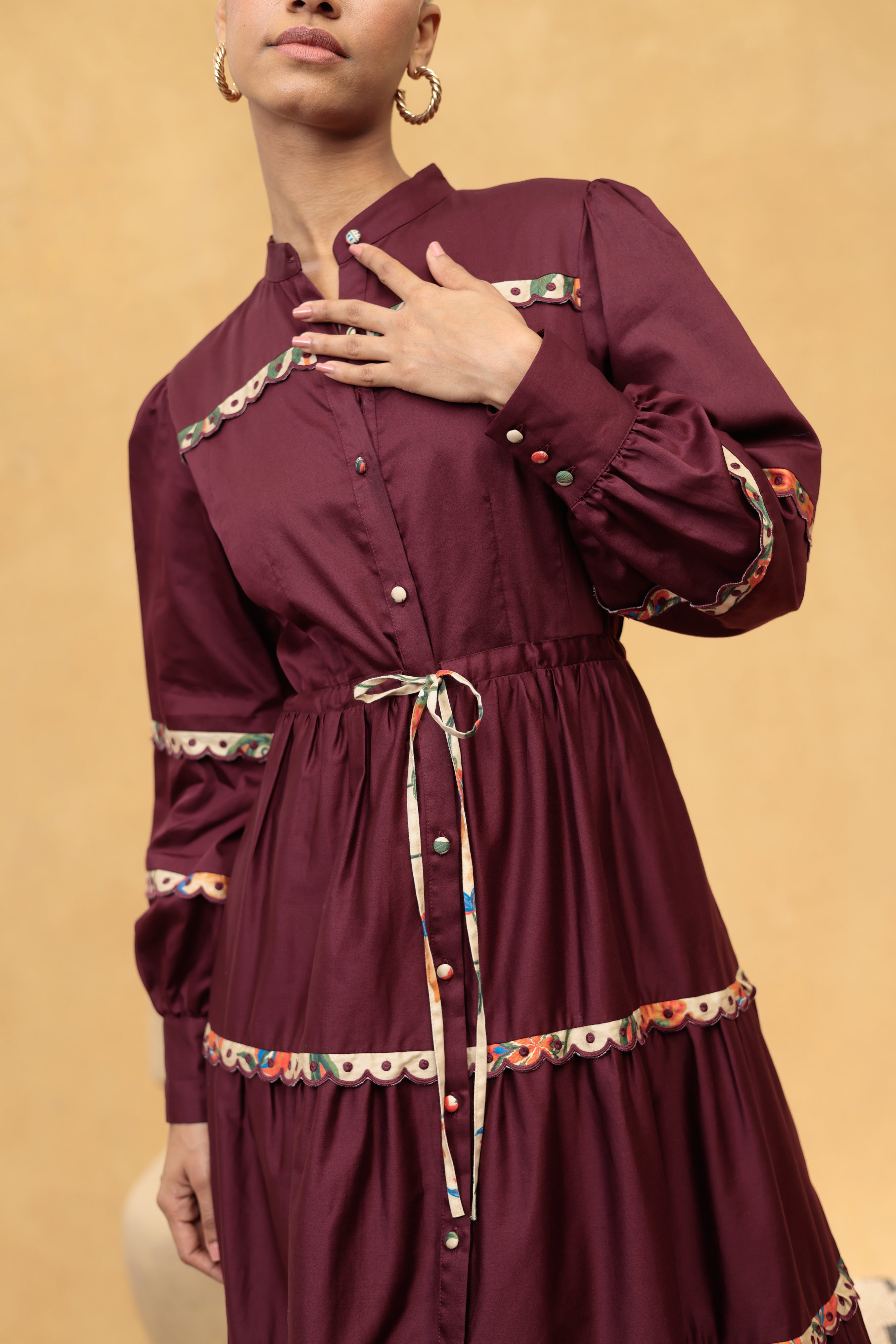Emily Lovelock Annette burgundy belted midi dress waist and decorative trim detail