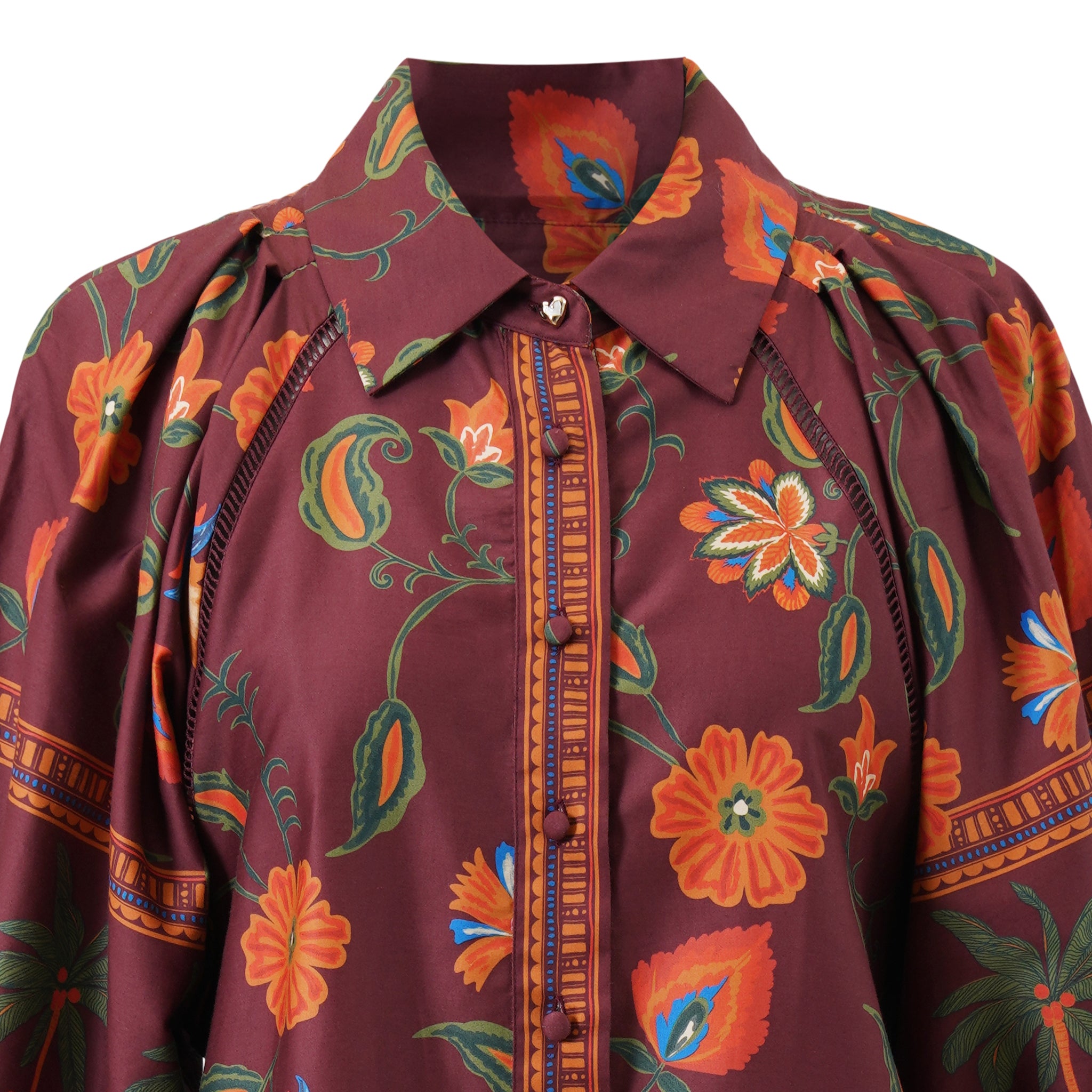 Close-up of Emily Lovelock Alisha burgundy floral blouse collar and contrast trim