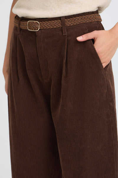 Close-up of Fransa Calana brown corduroy trousers front pleat and pocket