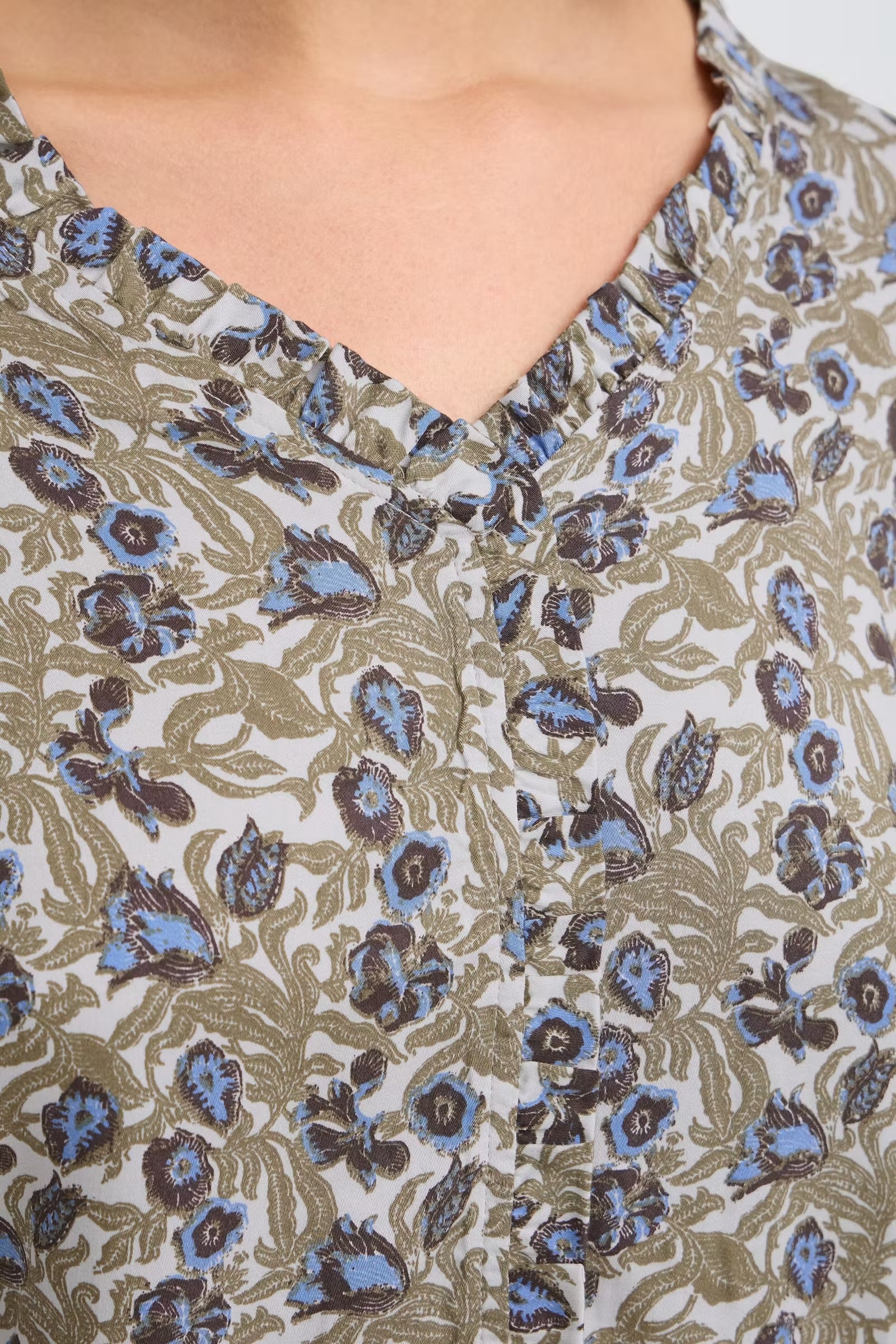 Close-up of Fransa Gladis floral blouse V-neckline and frill trim