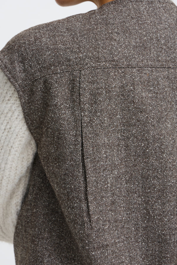 Close-up of Fransa Vea brown herringbone waistcoat textured fabric