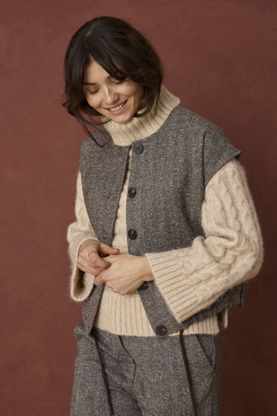 Fransa Vea Hot Fudge herringbone waistcoat layered over cream knit