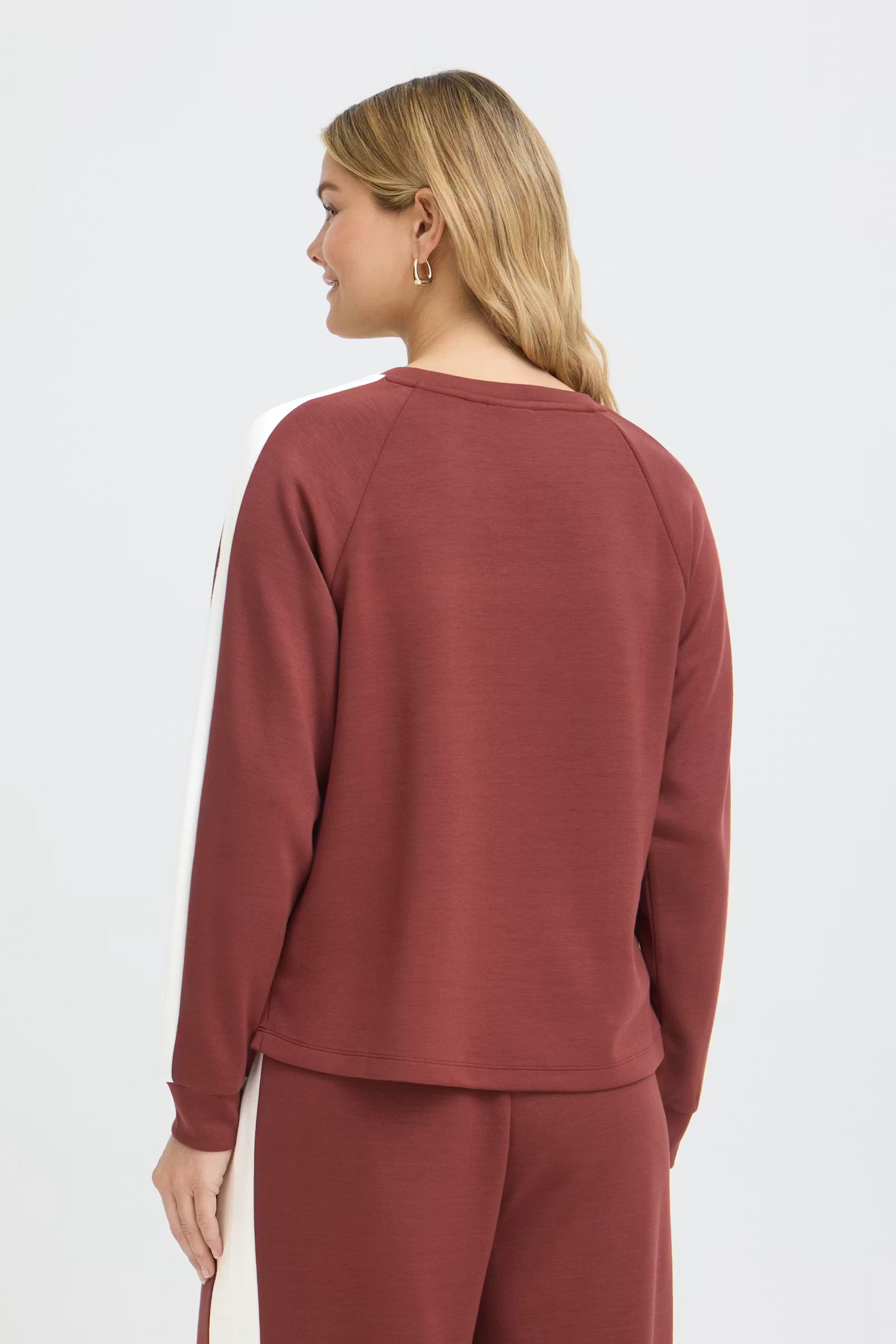 Back view of Fransa Aurora burnt orange and white sweatshirt