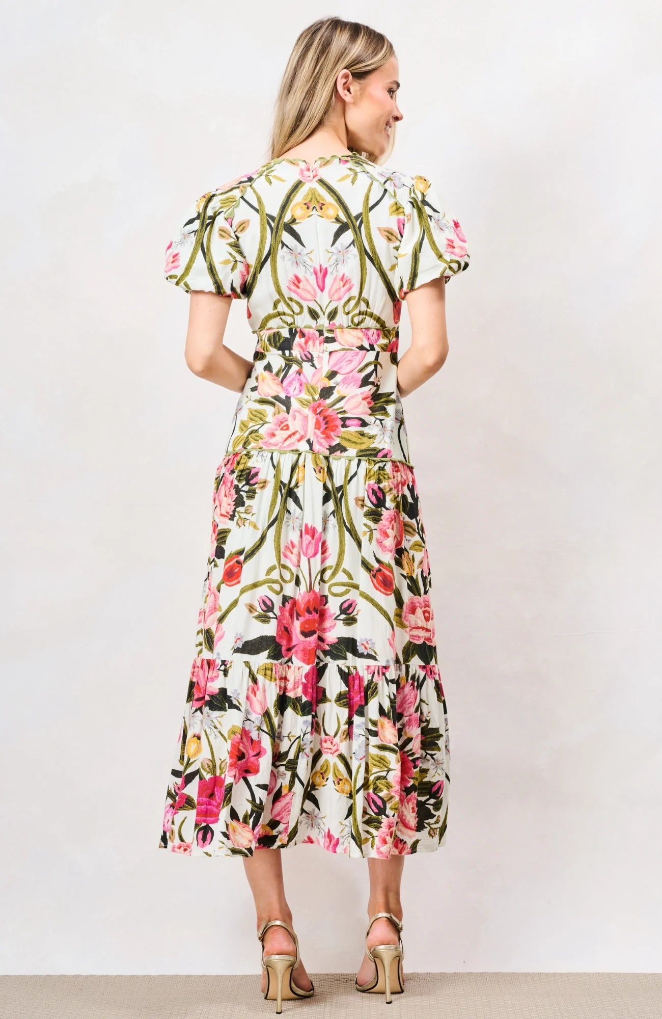 Back view of Hope & Ivy Angie cream and pink floral tiered midi dress