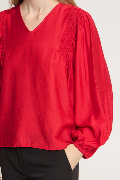 Close-up of ICHI Imelda red blouse gathered shoulder and balloon sleeve detail