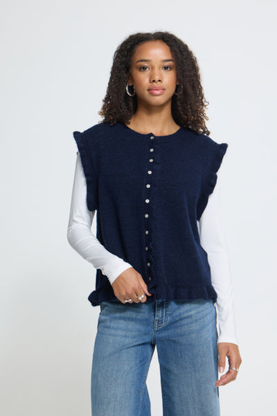 ICHI Povoke Total Eclipse navy knitted waistcoat layered over a white long sleeve top