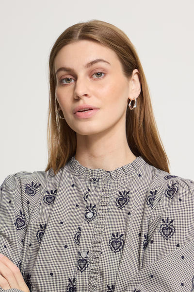Close-up of ICHI Heloza dark blue print blouse ruffled stand collar
