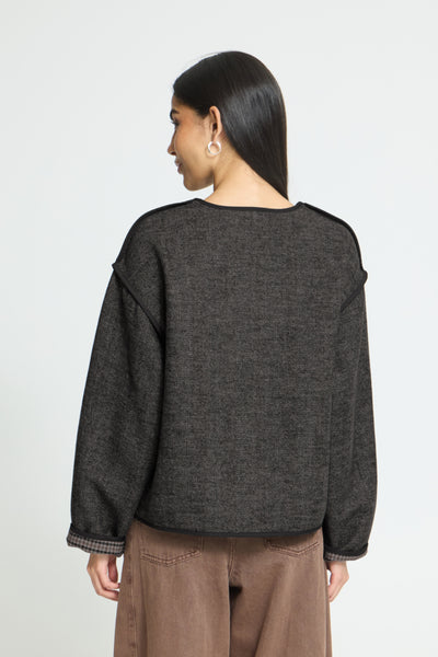 Back view of ICHI Frava black boxy herringbone jacket
