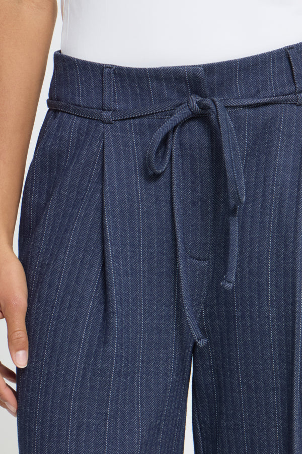Close-up of ICHI Kate Pinelle navy pinstripe trousers high waist and tie detail