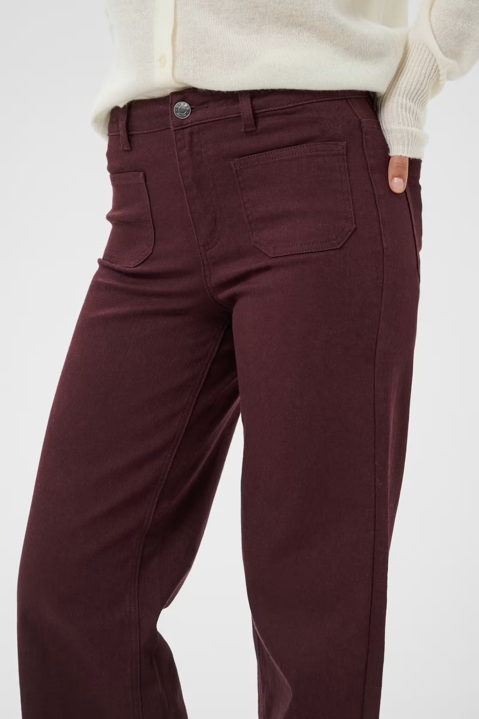 Close-up of Kaffe Brook burgundy twill jeans high waist and front pockets