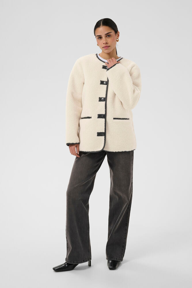 Kaffe Sandra Turtledove contrast trim teddy jacket styled with trousers