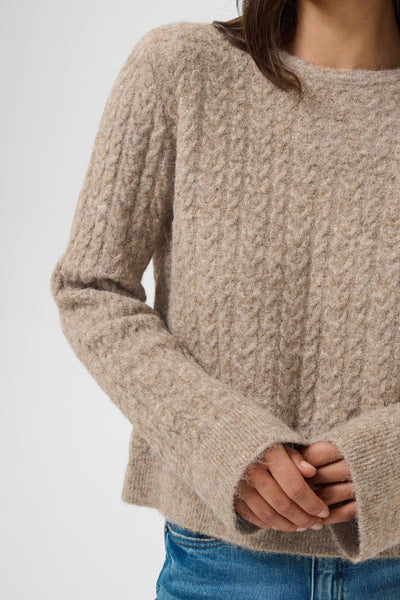 Close-up of Kaffe Melanie beige jumper cable knit sleeve detailing