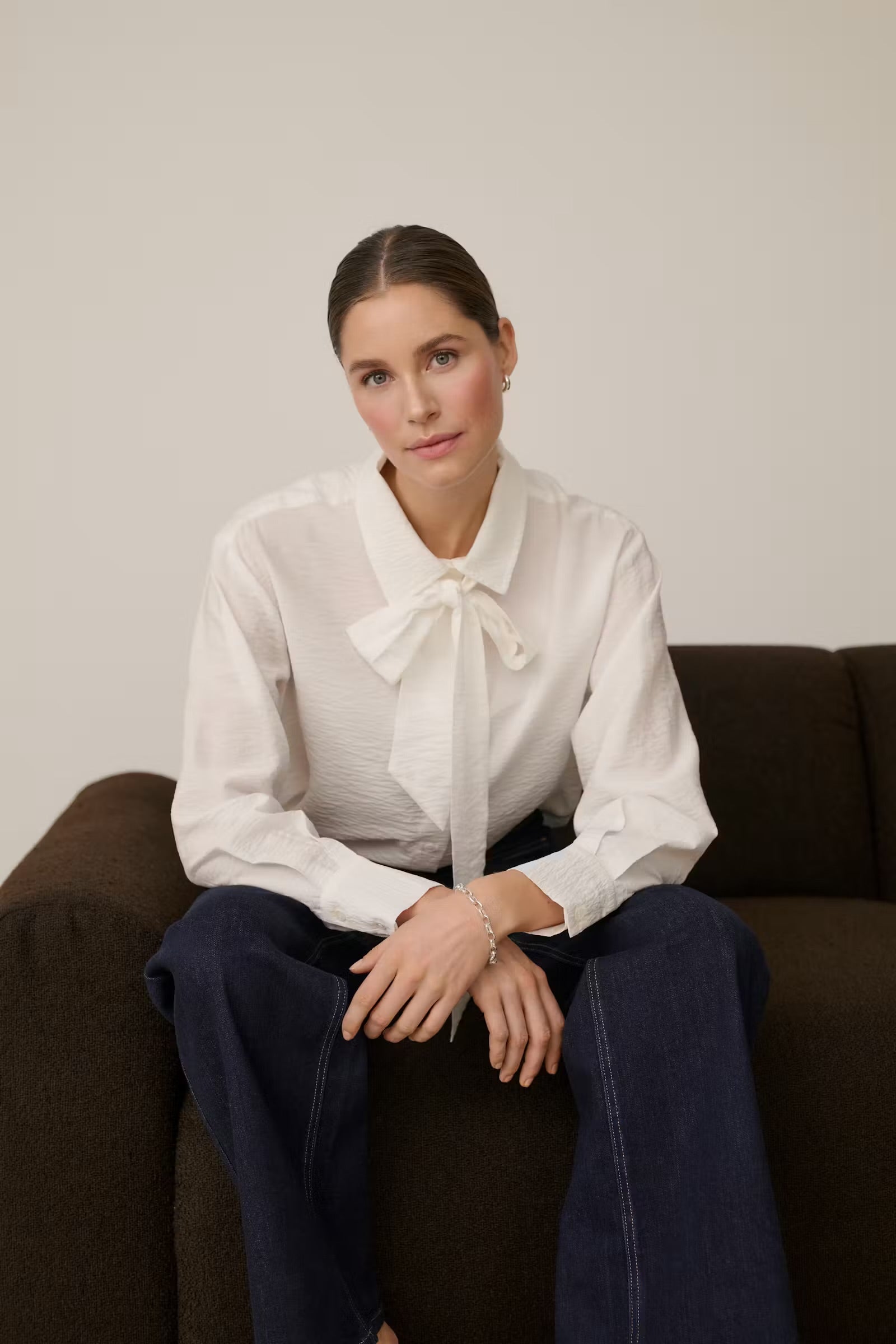 Kaffe Gilda chalk white pussy bow blouse styled front view