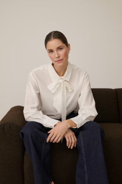 Kaffe Gilda chalk white pussy bow blouse styled front view