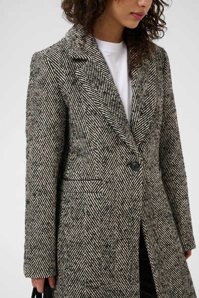 Close-up of Kaffe grey herringbone coat notched lapel and button fastening