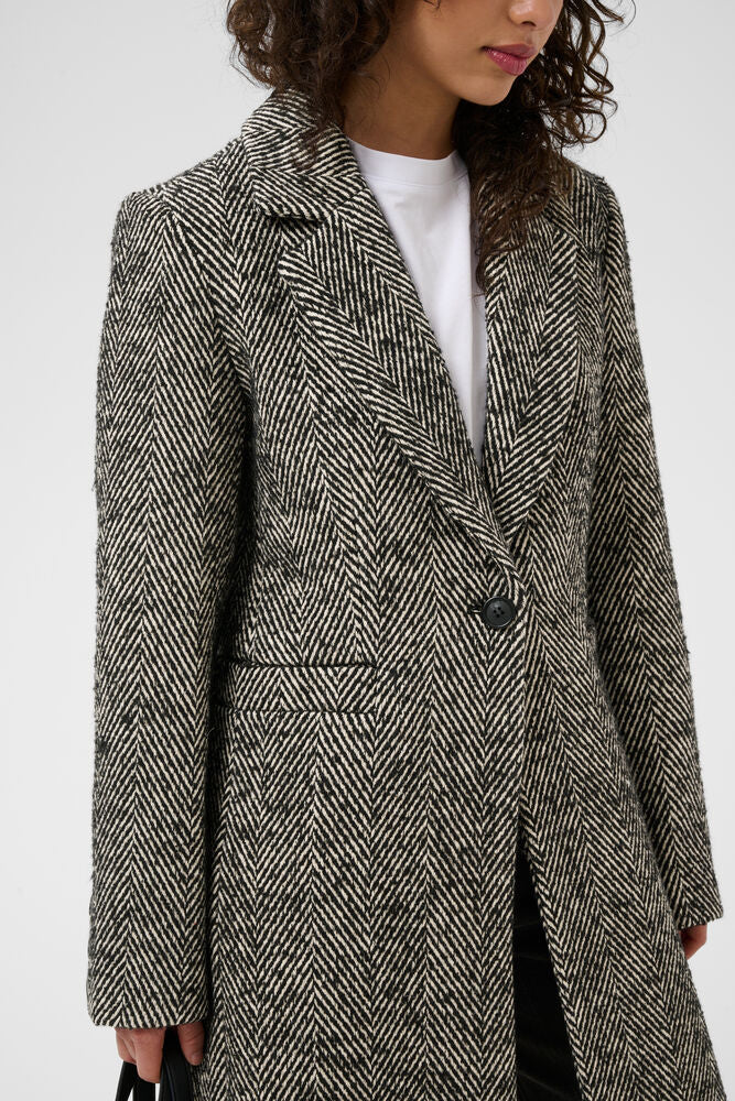 Close-up of Kaffe grey herringbone coat notched lapel and button fastening