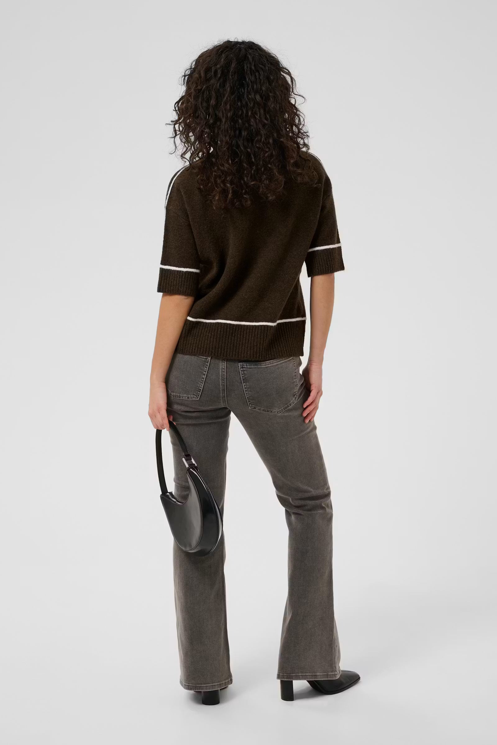 Back view of Kaffe Jinie coffee brown knit jumper styled with denim