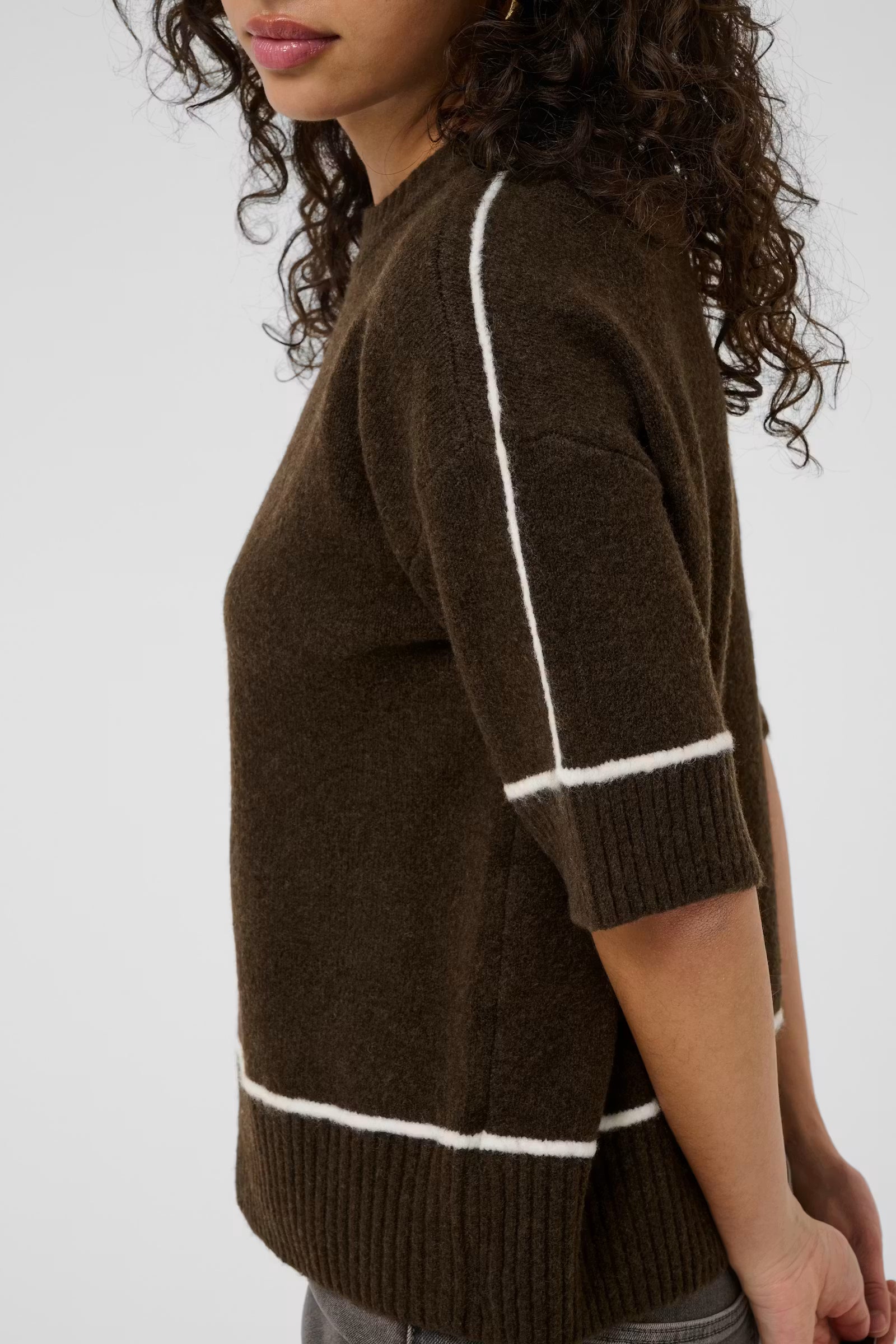 Side view of Kaffe Jinie brown jumper with cream sleeve and hem trim