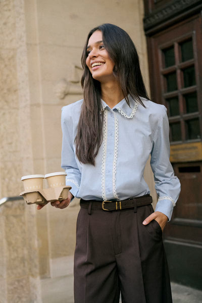 Kaffe Kaketty light blue button-up blouse styled outdoors - trending colour combos AW 2026