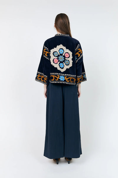 Back view of Lollys Laundry Amby navy embroidered jacket with large floral motif