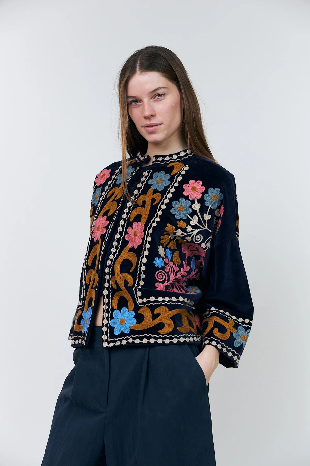 Close-up of Lollys Laundry Amby navy Aari jacket colourful floral embroidery