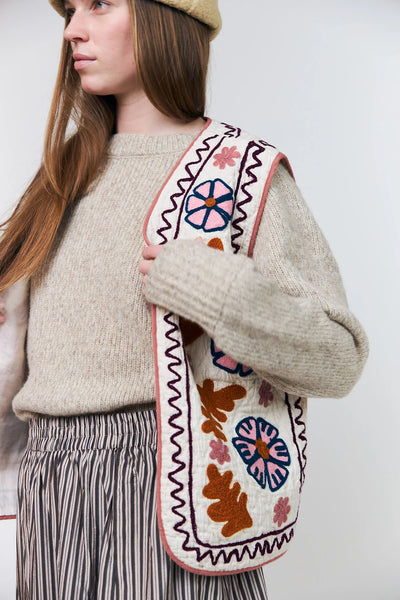 Lollys Laundry Honey embroidered waistcoat layered over a beige knit jumper