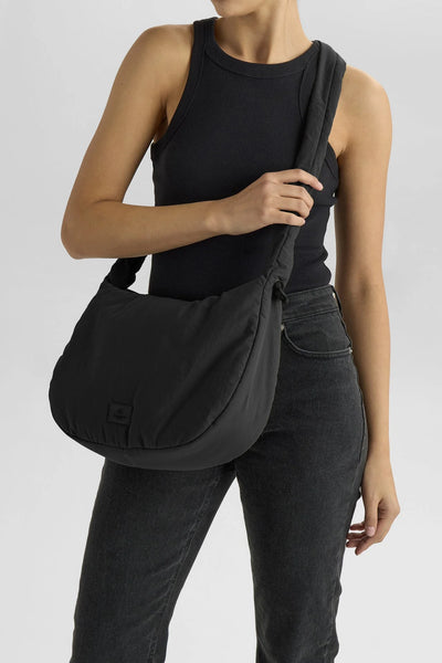 Markberg Ground black recycled crossbody bag worn over the shoulder