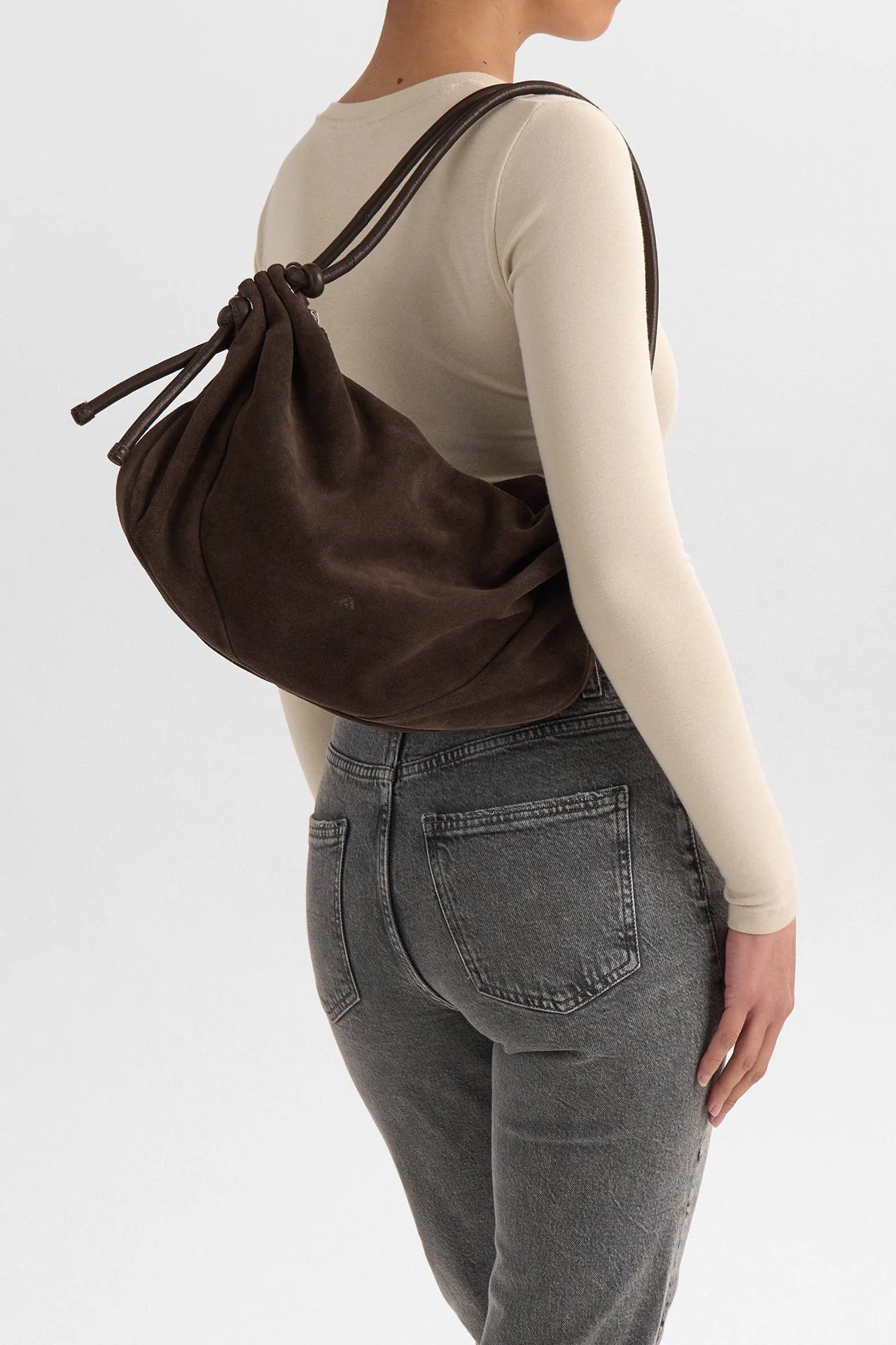 Markberg Reign Major Brown suede shoulder bag worn over the shoulder
